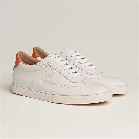 white hermes sneakers.